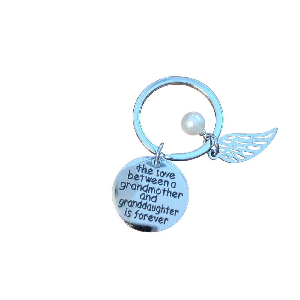Silver Keychain with Wing and Pearl Charm